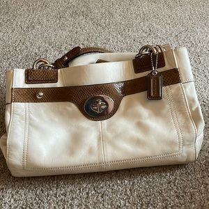Cream colored Coach purse with matching wallet